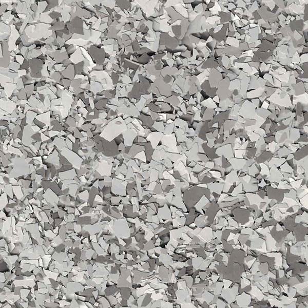 The image shows a pile of gray, irregular-shaped particles or fragments clustered together, resembling crushed stone or demolished concrete with varying sizes and edges.