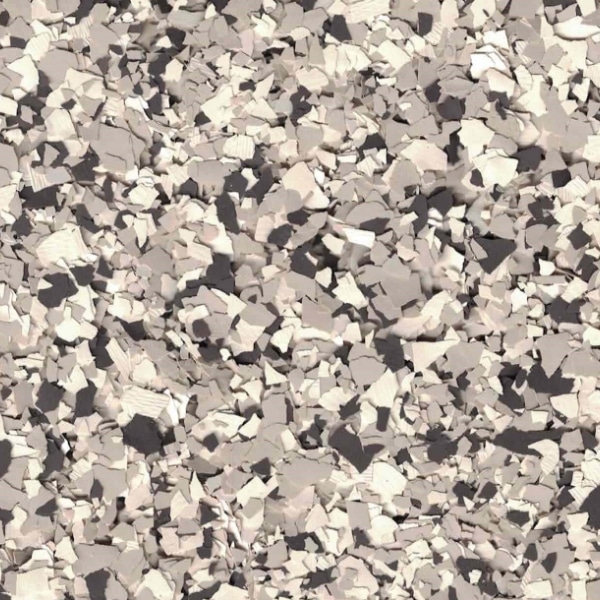 This image shows a chaotic pattern of various sized broken or shattered pieces, predominantly in shades of gray, creating an abstract mosaic-like texture.